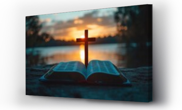 Wizualizacja Obrazu : #1112045460 Wooden cross and open Bible on seashore at sunset, spiritual reflection, faith and prayer, peaceful ocean horizon, symbolic religious imagery, glowing sky.