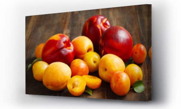 Wizualizacja Obrazu : #118711094 Stone fruits on wooden background. Yellow plums, apricots and nectarines