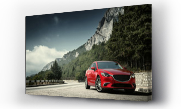 Wizualizacja Obrazu : #123522493 Czerwony samochód stojący na drodze w pobliżu gór w dzień