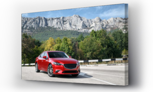 Wizualizacja Obrazu : #123637140 Czerwony samochód stojący na drodze w pobliżu gór w dzień