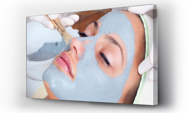 Wizualizacja Obrazu : #129379750 Girl with facial mask lying in beauty health spa center