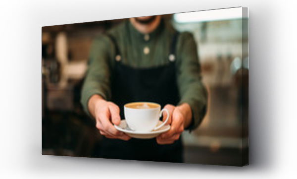 Wizualizacja Obrazu : #129973255 Kelner w czarnym fartuchu trzyma filiżankę kawy