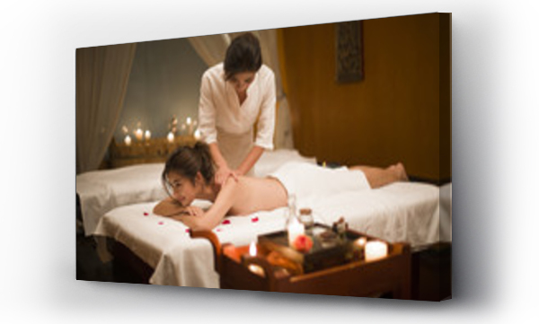 Wizualizacja Obrazu : #132119066 Masseuse giving a back massage to a woman in a spa