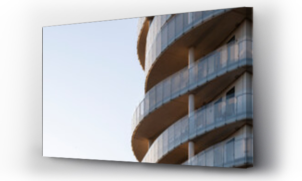 Wizualizacja Obrazu : #1377820607 Clean curves and minimal balcony lines on residential building in Bryggen, Copenhagen. Composition ideal for real estate, property marketing or architecture-focused visuals.