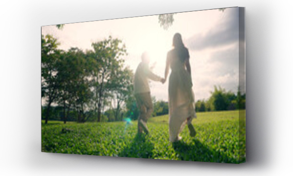 Wizualizacja Obrazu : #1423652674 Back rear view young lover asia people happy smile trust hold hand enjoy relax walk way forward to sun light. Just married asian man woman in nature field begin family dream of life love hope and care