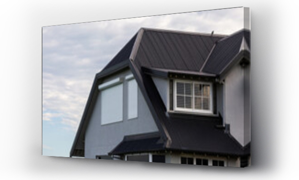 Wizualizacja Obrazu : #1583407014 sharp architecture of a double story house with steep dark coloured tin roof