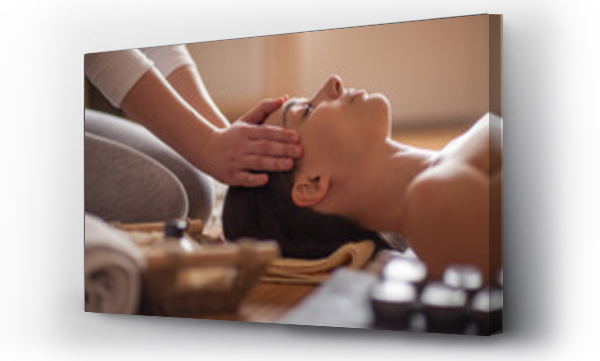 Wizualizacja Obrazu : #165149120 Woman receiving a head massage at spa