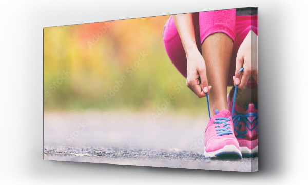 Wizualizacja Obrazu : #169255189 Running shoes runner woman tying laces for autumn run in forest park panoramic banner copy space. Jogging dziewczyna ćwiczenia motywacyjne heatlh i fitness.