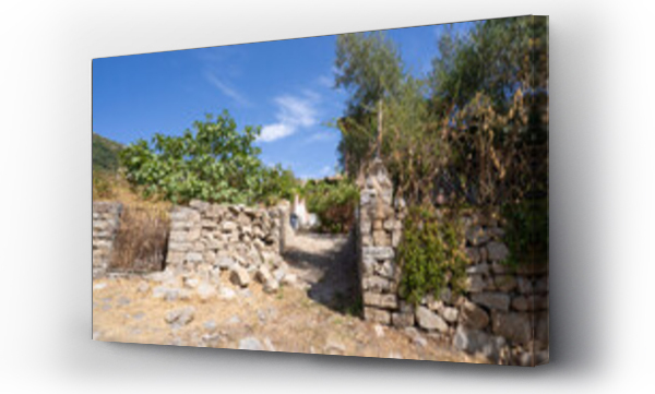 Wizualizacja Obrazu : #1702701840 Narrow cobblestone street with rustic stone houses in traditional Sardinian village