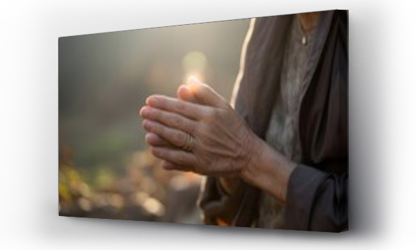 Wizualizacja Obrazu : #1716692078 An older persons hands clasped together as if in prayer or contemplation.