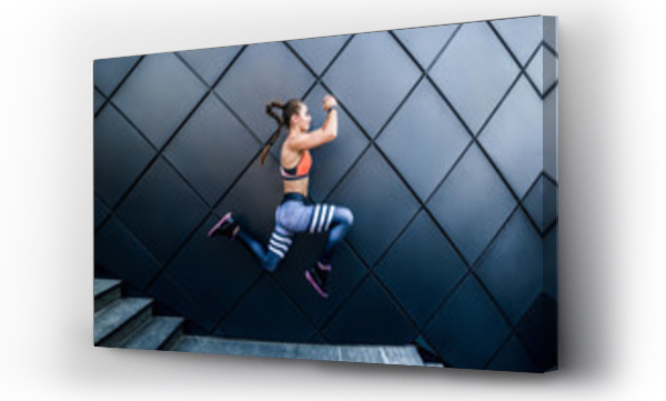 Wizualizacja Obrazu : #173439881 Shes in peak condition.Shot of a young woman jumping outdoors.