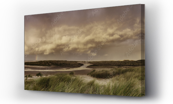 Wizualizacja Obrazu : #175990376 Storm clouds and rainbow at sunset. Holkham, Norfolk, UK.