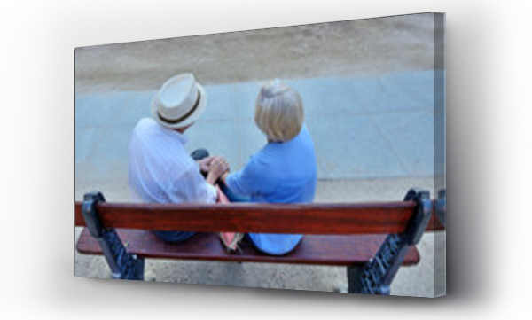 Wizualizacja Obrazu : #178999619 Pair of older people sitting on bench.