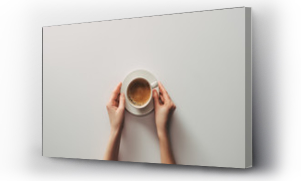 Wizualizacja Obrazu : #185466723 top view of female hands and cup of coffee with saucer on grey