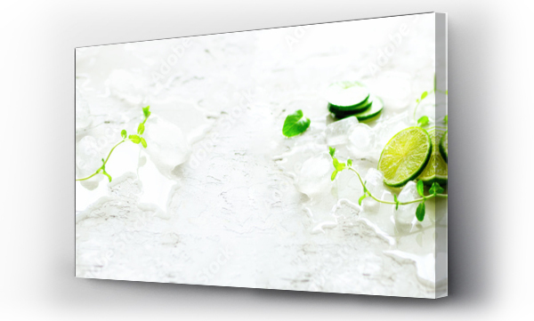 Wizualizacja Obrazu : #190061461 Homemade lime lemonade with cucumber, rosemary and ice, white background. Cold beverage, detox water. Copyspace. Banner