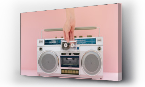 Wizualizacja Obrazu : #195249071 Hand inserting music tape into retro tape deck