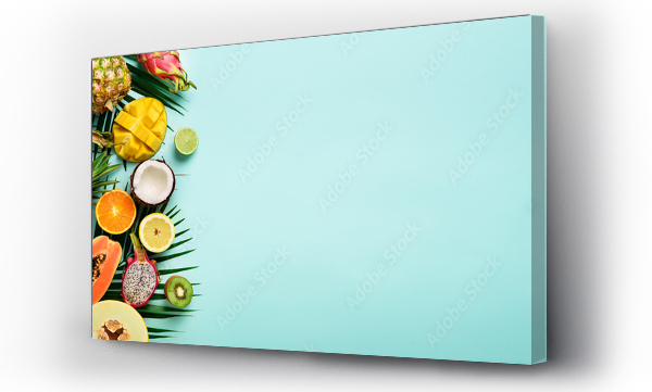 Wizualizacja Obrazu : #208873288 Exotic fruits and tropical palm leaves on pastel turquoise background - papaya, mango, pineapple, banana, carambola, dragon fruit, kiwi, lemon, orange, melon, coconut, lime. Banner. Top view.