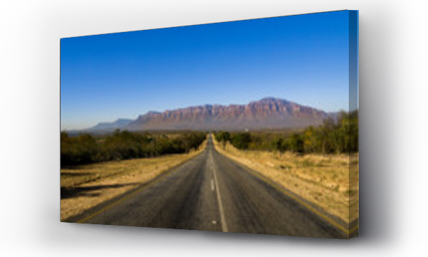 Wizualizacja Obrazu : #212382738 Two lane black top with mountains in the background in South Africa near Hoedspruit. 