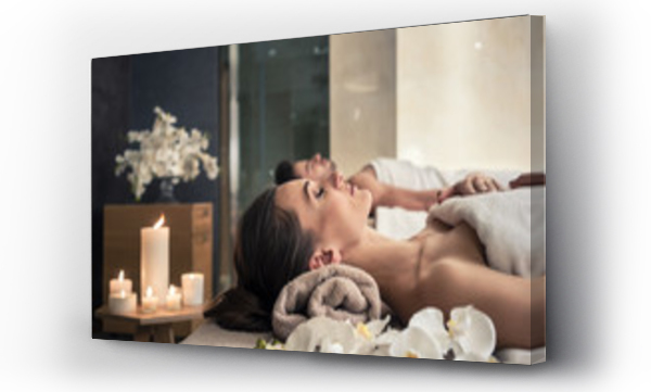 Wizualizacja Obrazu : #216498910 Young man and woman lying down on massage beds at Asian luxury spa and wellness center