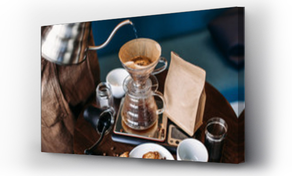 Wizualizacja Obrazu : #225599700 Hand drip coffee kit, barista pouring water on coffee ground with filter