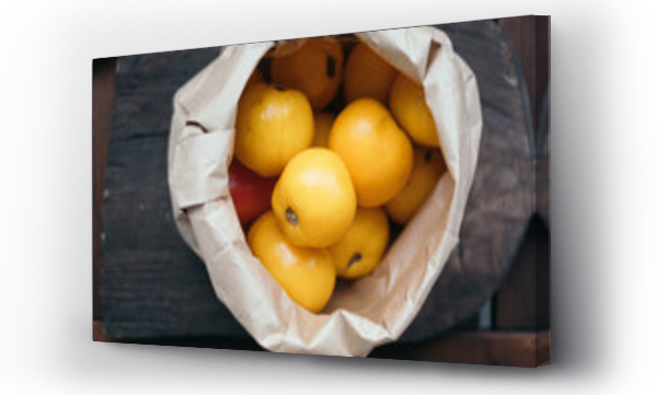 Wizualizacja Obrazu : #227570071 Yellow tomatoes  in a paper bag