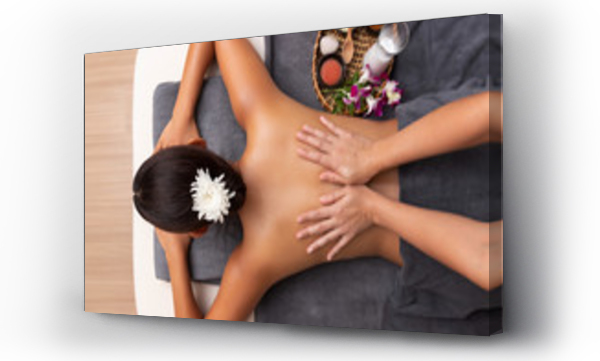 Wizualizacja Obrazu : #232899484 Asian woman enjoying a salt scrub massage at spa.