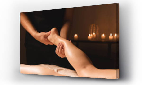 Wizualizacja Obrazu : #240564252 Close-up of male hands doing calf massage of female legs in a dark room with candles in the background. Cosmetology and spa treatments