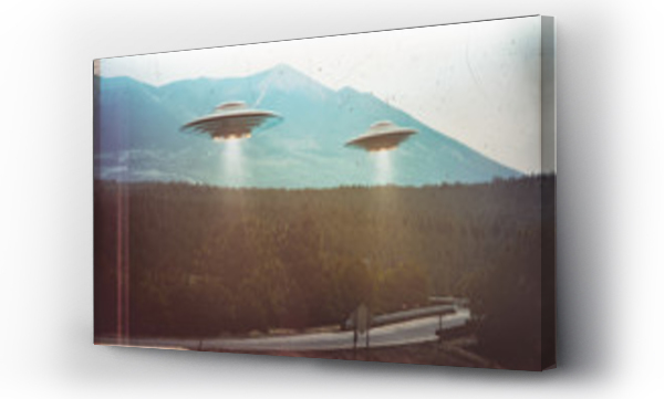 Wizualizacja Obrazu : #241792774 Unidentified flying object. Two UFOs flying over a road among the trees. 3D illustration retro photo vintage. Noise and defects of old photo film.