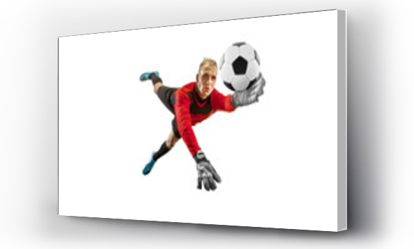 Wizualizacja Obrazu : #250820772 Male soccer player goalkeeper catching ball in jump. Silhouette of fit man with ball isolated on white studio background