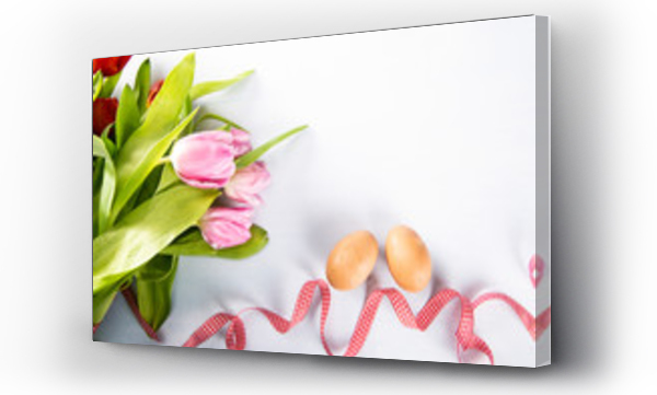 Wizualizacja Obrazu : #253573123 Wielkanocne, wiosenne tlo. Jaja i kolorowe kwiaty