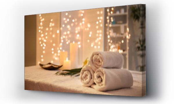 Wizualizacja Obrazu : #254840584 Rolled towels on table in spa salon