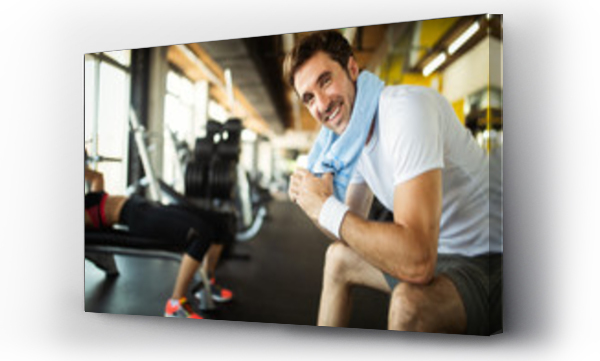 Wizualizacja Obrazu : #261937203 Lifestyle portrait of handsome muscular man after the training in the sport gym