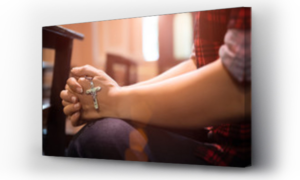 Wizualizacja Obrazu : #271338746 Woman hand holding rosary against cross and praying to God at church.