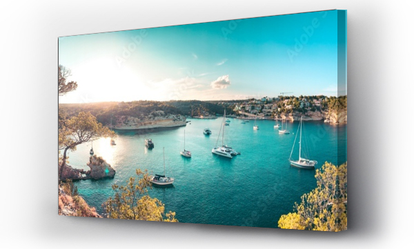 Wizualizacja Obrazu : #272391039 Panorama view of a beach bay with turquoise blue water and sailing boats and yachts at anchor with framed pine trees. Lovely romantic Cala Portals Vells, Mallorca, Spain. Balearic Islands
