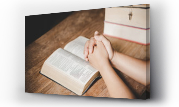 Wizualizacja Obrazu : #282213102 Spirituality and religion, Hands folded in prayer on a Holy Bible in church concept for faith.