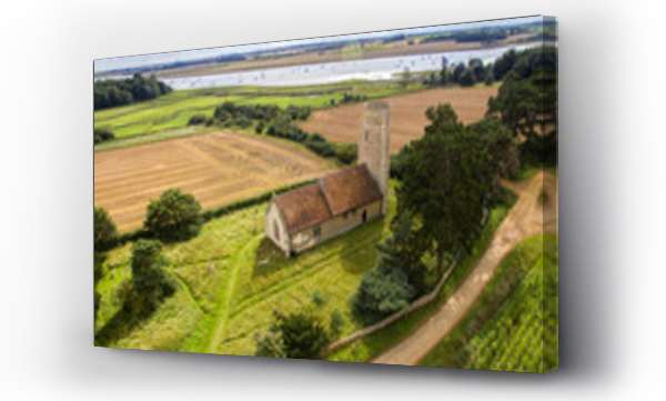 Wizualizacja Obrazu : #283388300 An aerial photo of Ramsholt church. A beautiful traditional church with a round tower located in the beautiful Suffolk countryside close to the River Deben