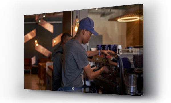 Wizualizacja Obrazu : #291781706 Young man preparing coffee at the coffee shop