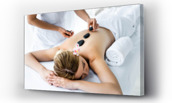 Wizualizacja Obrazu : #293575295 cropped view of masseur doing hot stone massage to woman in spa
