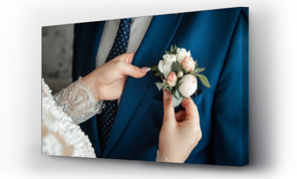 Wizualizacja Obrazu : #300194320 Butonierka dla pana młodego. Pojęcie małżeństwa, relacje rodzinne, akcesoria ślubne.
