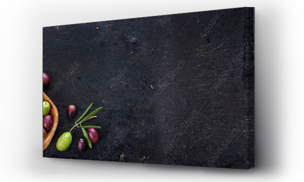 Wizualizacja Obrazu : #311589784 Top view of organic olive fruit on rustic black background.