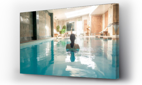 Wizualizacja Obrazu : #313670472 Rear view of a woman relaxing in spa pool