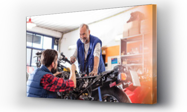 Wizualizacja Obrazu : #315207855 Motorcycle mechanics fixing motorcycle in workshop