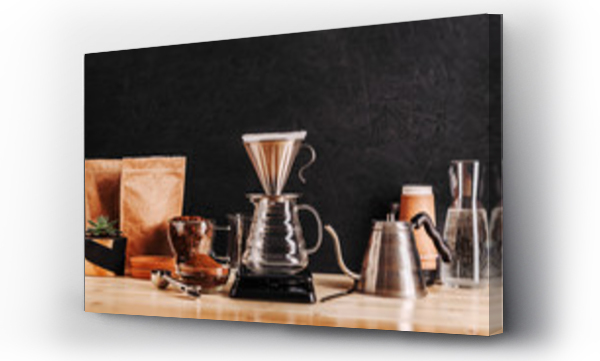 Wizualizacja Obrazu : #317025020 Alternative method of making coffee using a funnel filter, accessories for coffee drinks on a wooden table