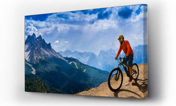 Wizualizacja Obrazu : #318568311 Cycling woman and man riding on bikes in Dolomites mountains andscape. Couple cycling MTB enduro trail track. Outdoor sport activity.