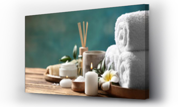 Wizualizacja Obrazu : #326013574 Beautiful spa composition with plumeria flower on wooden table. Space for text