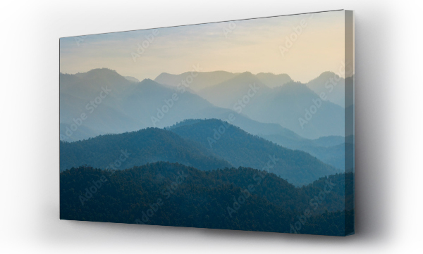 Wizualizacja Obrazu : #326853980 Amazing wild nature view of layer of mountain forest landscape with cloudy sky. Natural green scenery of cloud and mountain slopes background. Maehongson,Thailand. Panorama view.