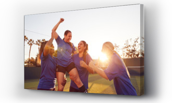 Wizualizacja Obrazu : #334513059 Womens Football Team Celebrating Winning Soccer Match Lifting Player Onto Shoulders