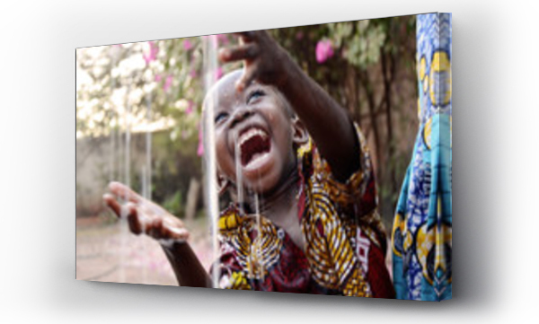Wizualizacja Obrazu : #341396447 Incredibly Happy African Child Enjoying the Rain as a Water Scarcity Symbol