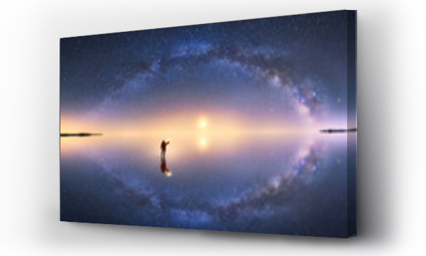 Wizualizacja Obrazu : #342088379 Silhouette of anonymous man standing on reflection surface of water and reaching out to starry colorful night sky with milky way