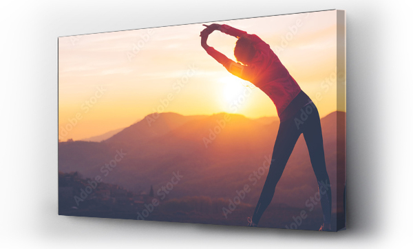 Wizualizacja Obrazu : #355702856 Athletic girl doing stretching after the evening jog. Sport tight clothes.